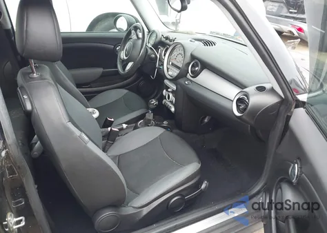 2009 Mini Cooper from USA, damaged, VIN WMWMF33539TW71972